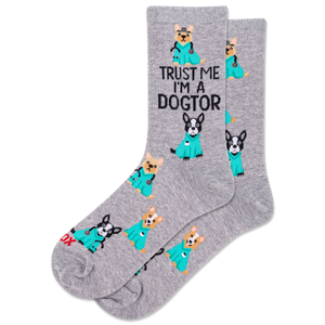Gray socks with cartoon dog illustrations and text 'Trust Me I'm a Dogtor' on a white background