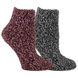 Two pairs of textured socks, one pink and one gray, on a white background.