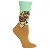 A single crew sock with a two-tone design, featuring a light brown lower half and a mint green upper half with a printed sunflower bouquet illustration.