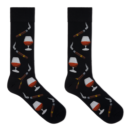 A pair of black crew socks with a repeating pattern of cognac whiskey glasses, cigars, and smoking pipes, displayed flat against a solid white background.