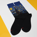 Black socks with Starry Night design on a white and yellow background thumbnail