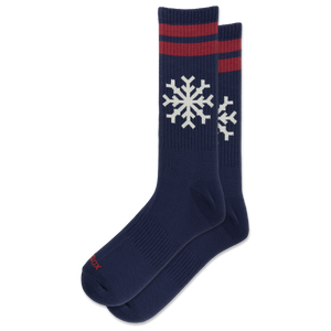 A pair of navy blue crew socks with red stripes near the top and white snowflake motifs, displayed on a clean white background.