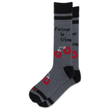 A pair of heather gray crew socks with black cuffs, heels, and toes, featuring a graphic of red handcuffs and the text 'Partner in Crime' on the sides.
