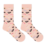 A pair of crew socks in a light peach-pink color, printed with a playful pattern of various sushi and sashimi illustrations, shown against a plain white background.