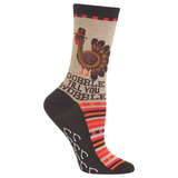 Sock with a turkey design and text 'Gobble Till You Wobble' on a beige background