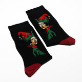Pair of socks with elf design on a white background