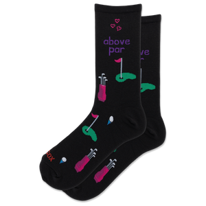 A pair of black crew socks with a golf-themed print, featuring pink and green golf clubs, flags, greens, and the text 'above par' in purple, displayed on a clean white background.