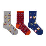 Three pairs of patterned crew socks displayed side by side on a plain white background. The left sock is heather gray with cartoon skateboarder prints. thumbnail