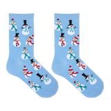 A pair of light blue crew socks with a repeating pattern of cartoon snowmen in winter clothing, shown against a plain white background.