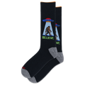 A pair of black crew socks with gray heels and toes, featuring a graphic of a Bigfoot silhouette under a UFO with the word 'BELIEVE' in green.