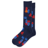 A pair of navy blue crew socks featuring a pattern of red and blue puzzle pieces, displayed against a solid white background.