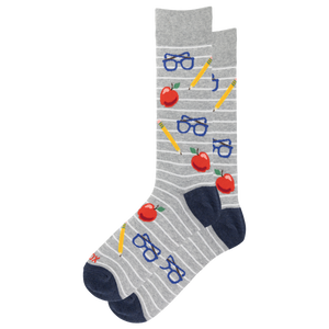 A pair of gray crew socks with thin white horizontal stripes, featuring a playful school-themed pattern of red apples, blue glasses, yellow pencils, and navy blue heels and toes.