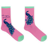A pair of pink crew socks with mint green toes and heels, featuring a large blue and green peacock design and the text 'always sparkle' on one sock, shown on a white background. thumbnail