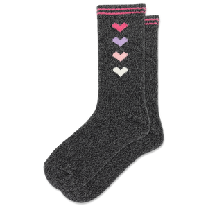 A pair of dark heather gray crew socks with four knitted hearts in pink, purple, light pink, and white down the side, finished with pink and white striped cuffs.