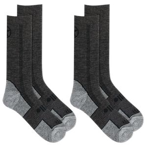 Two pairs of black socks with gray accents on a white background