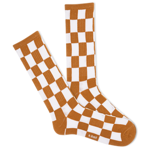 A pair of brown and white checkered crew socks.