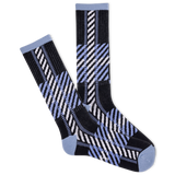 Pair of black, blue, and white patterned socks on a white background thumbnail