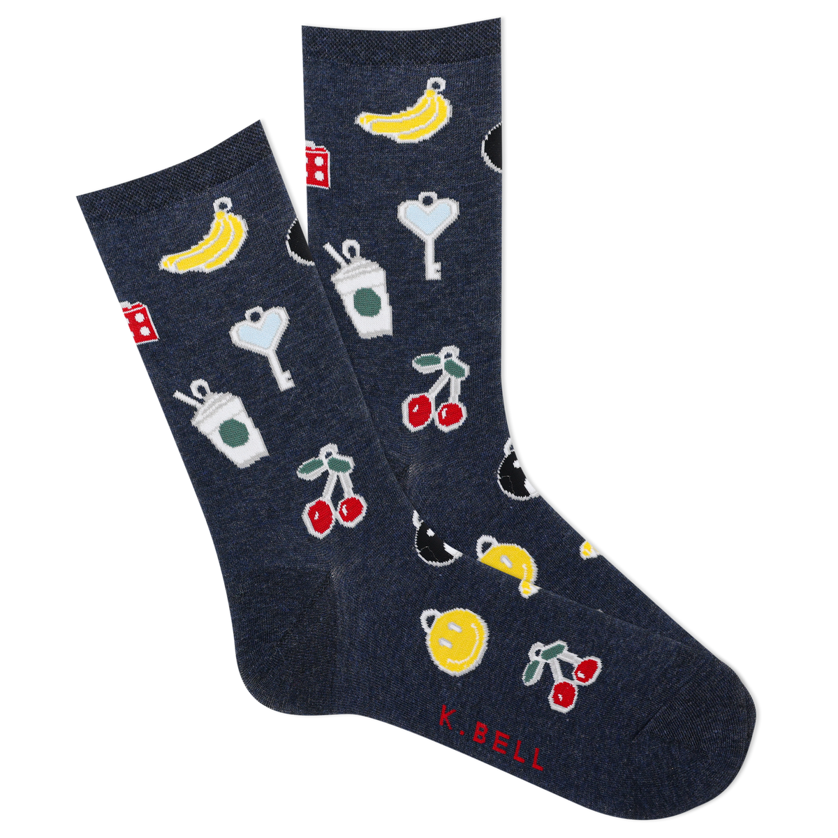 A pair of navy blue crew socks with various colorful patterns including a banana, cherries, a mug with whipped cream, a lemon, and other novelty items.
