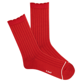 Red ribbed socks with white trim on a white background
