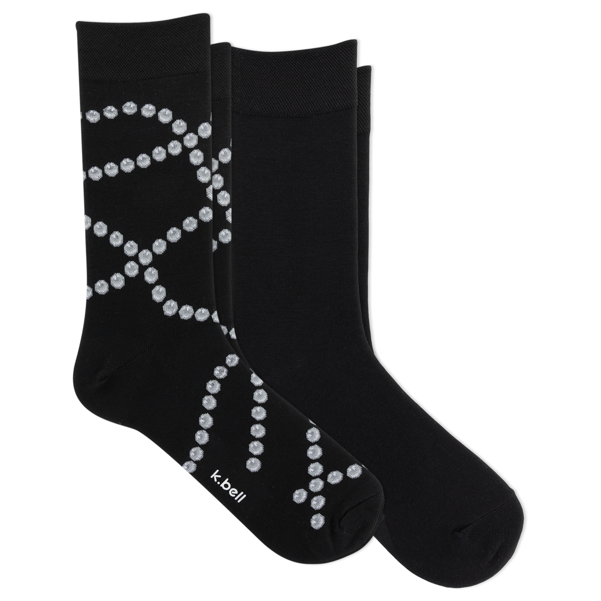 Two black crew socks with a white dotted pearl pattern, displayed on a clean white background. The brand name 'k-bell' is printed in white near the toe of the front sock.
