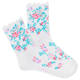 A pair of white crew socks with a floral print and lettuce-edge trim. thumbnail