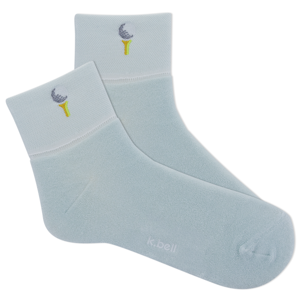 Light blue socks with embroidered designs on a white background