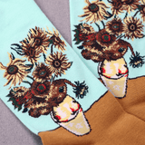 Socks with sunflower and bear design on a light blue background thumbnail