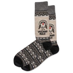 Sock with 'Vegans Rule' text and pattern on a white background