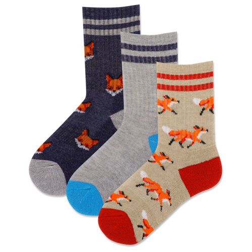 Three pairs of socks with fox patterns on a white background