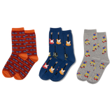 Three pairs of socks with cars, guitars and kateboarder patterns on a white background
