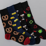Four pairs of socks with various patterns on a gray background
