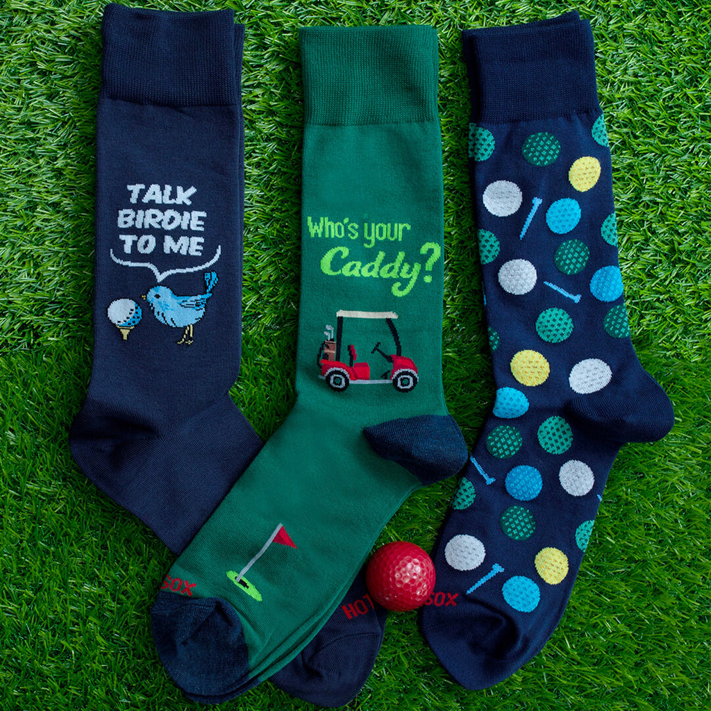 Thre pairs of HOTSOX men's golf-themed novelty socks.