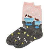 A pair of women's crew socks with dog-themed designs on a white background