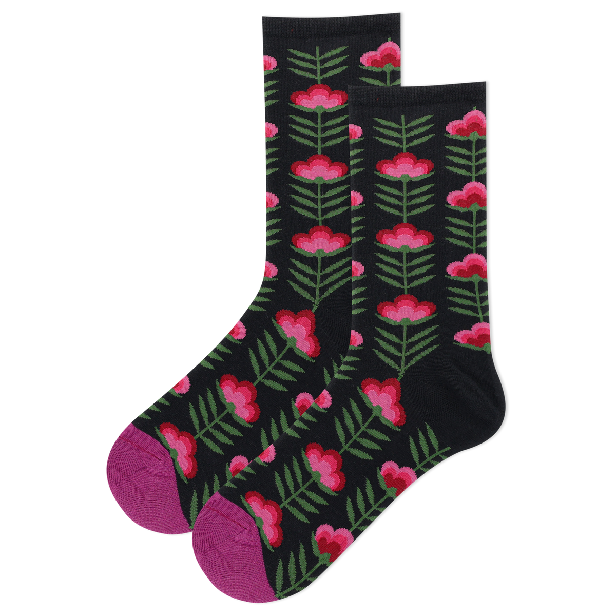 Person wearing black and pink retro floral patterned socks on a green background