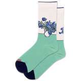 Green socks with floral design on a white background