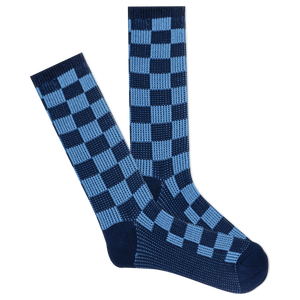 Pair of blue and navy checkered socks on a white background