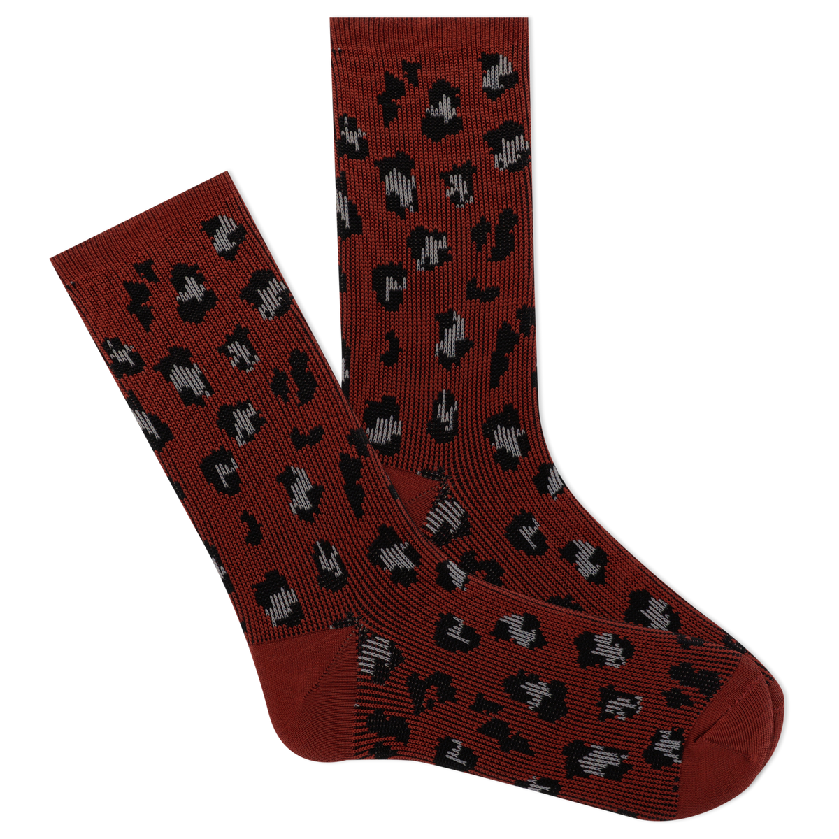 A pair of red boot crew socks with a leopard print pattern.