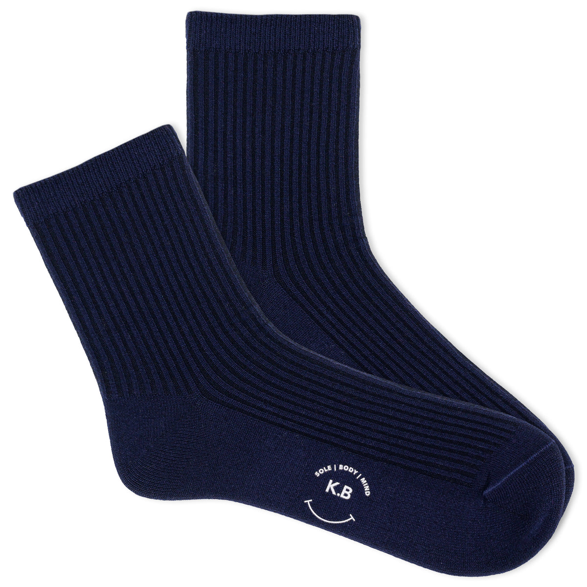 Red and striped socks with a K.Bell brand logo on a beige surface