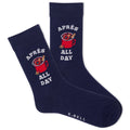 A pair of navy crew socks with a white and red graphic design featuring a hot toddy and the phrase 'aprés all day'