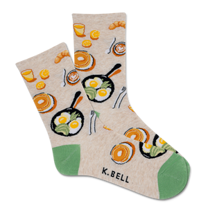 Pair of socks with food-themed design on a beige background, featuring the brand 'K. Bell'.