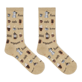 A pair of tan crew socks with coffee-related graphics such as cups and beans. thumbnail